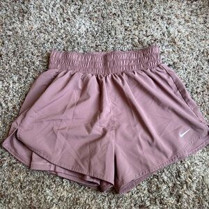 Womens Nike Dri-Fit running shorts.